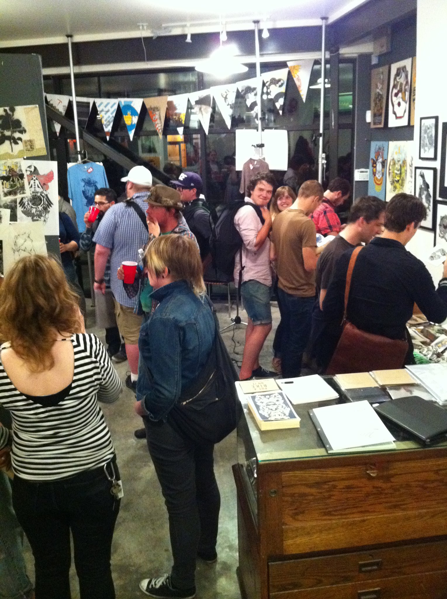 Opening night interior crowd at 112 PrintWorks