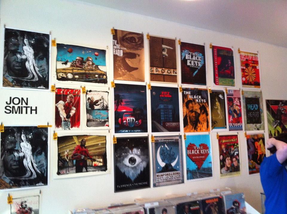 Jon Smith solo show poster wall at 112 PrintWorks